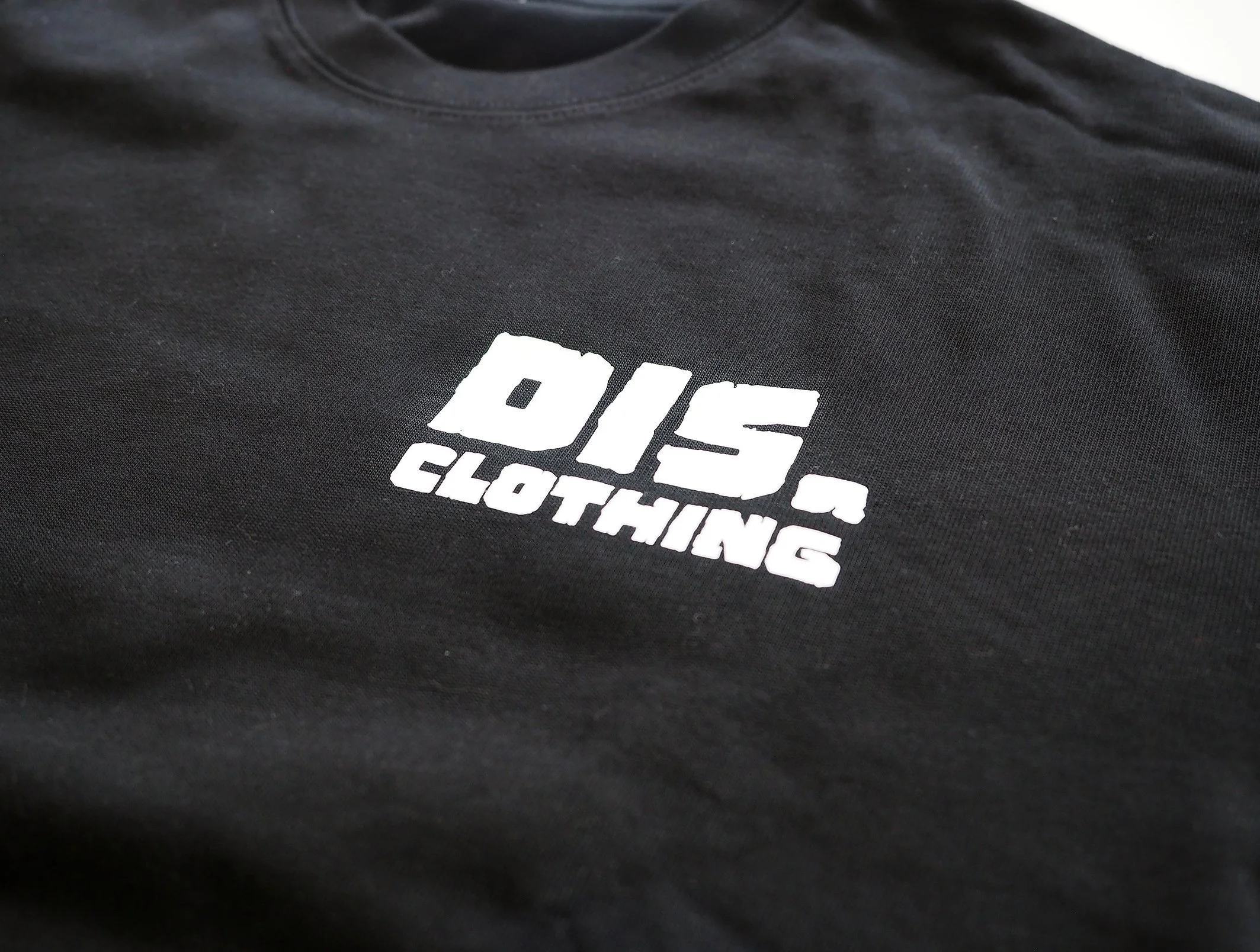 DIS LOGO FRONT CLOSE UP.jpg