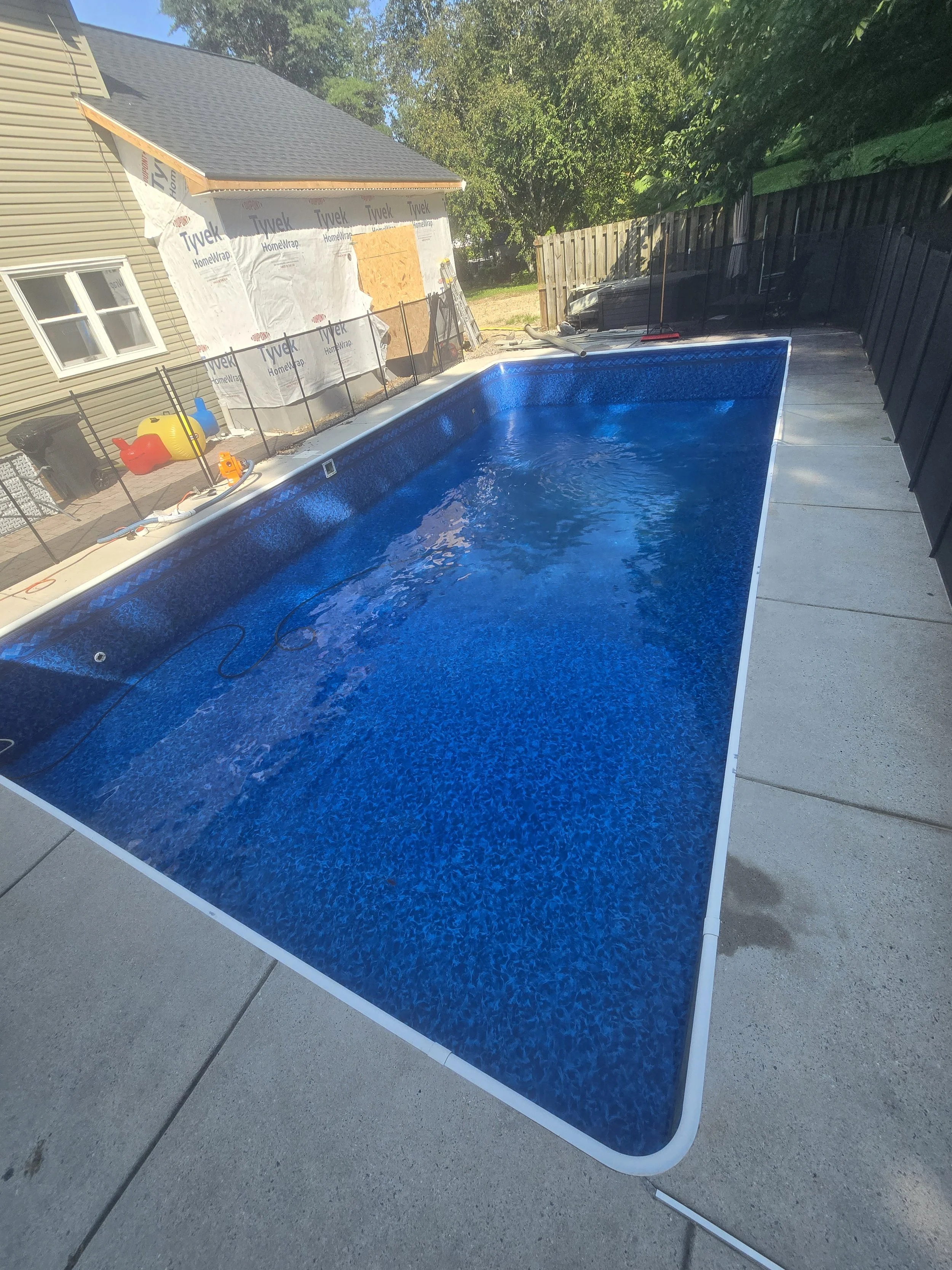 Pool drained, patched, and refilled