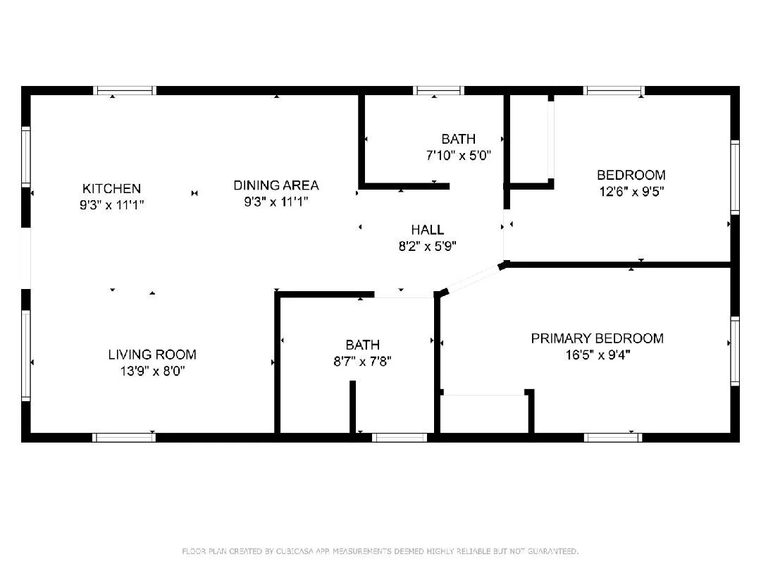 Floor plan of a house with labeled rooms including living room, kitchen, dining area, two bathrooms, hall, two bedrooms, and primary bedroom with dimensions.