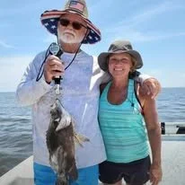 Don and Tiff triple tail