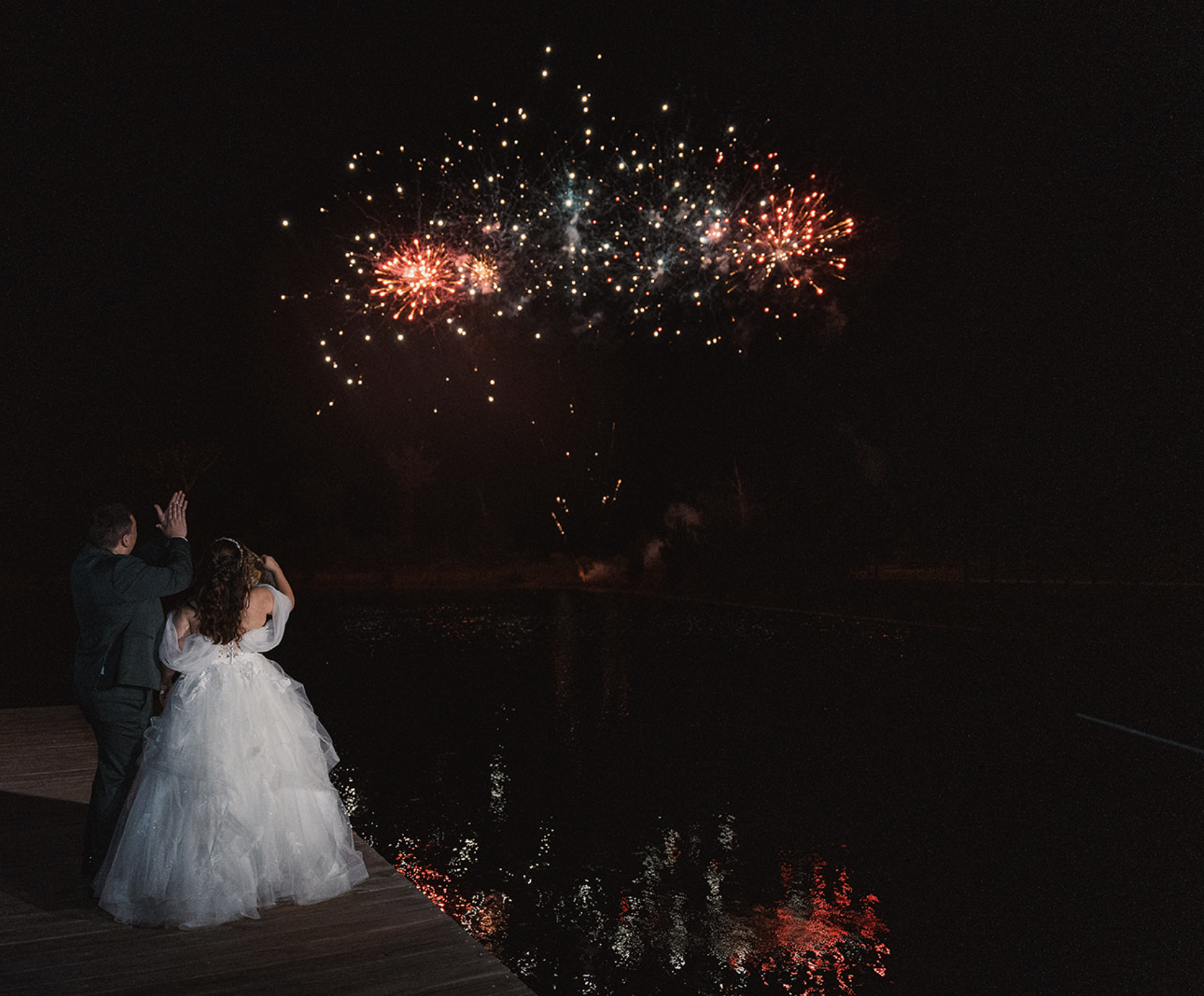 couple-wedding-firework-send-off-lake-houston.png