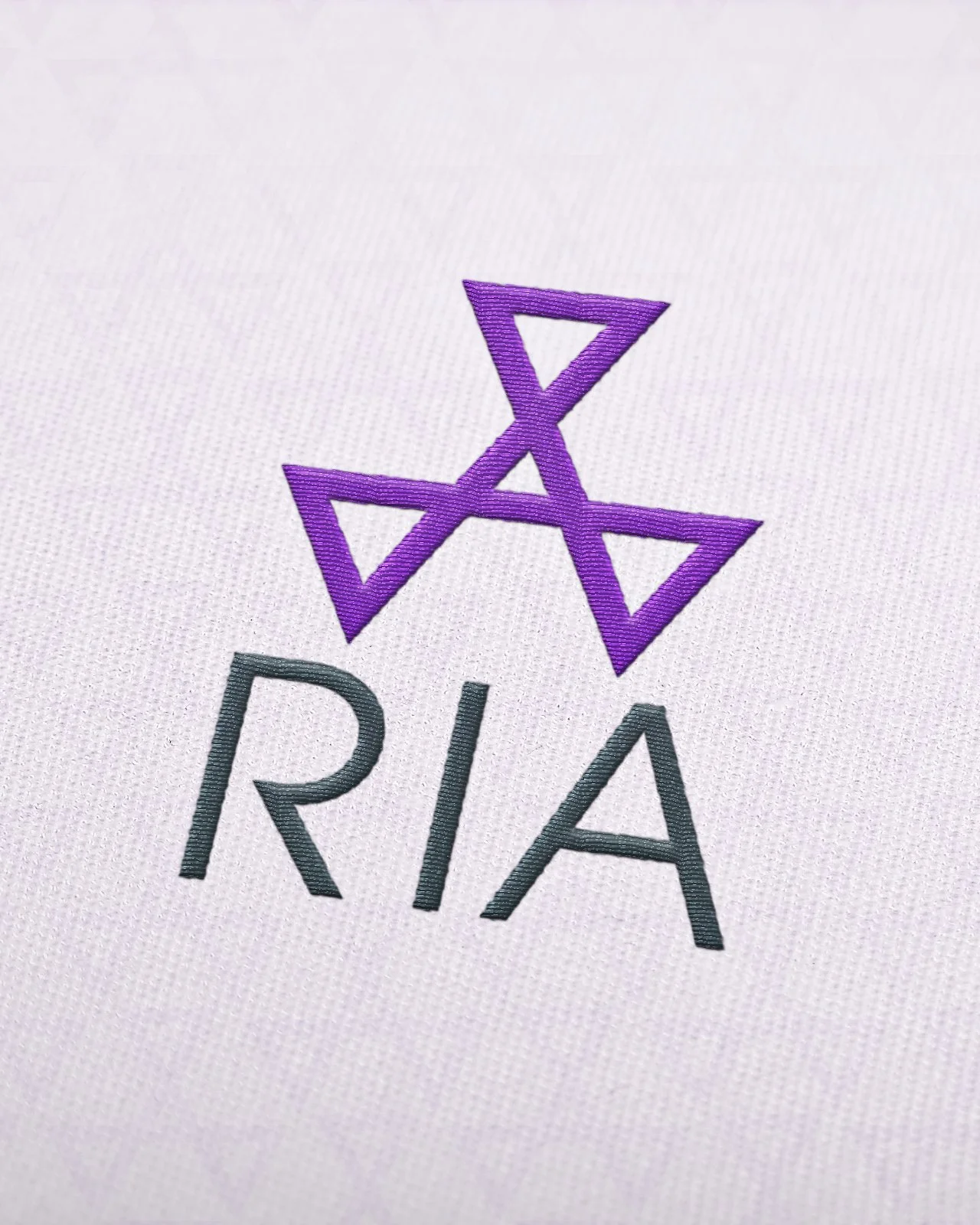 RIA-Embroidered-Logo-MockUp-pysty.jpg
