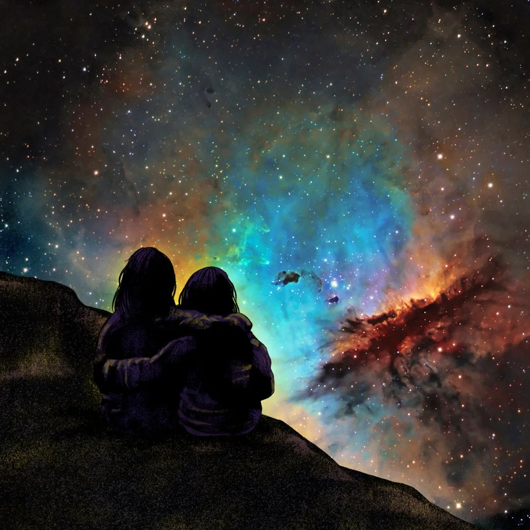 Silhouettes of two people sitting on a dark hilltop, looking at a colorful, star-filled nebula in outer space.