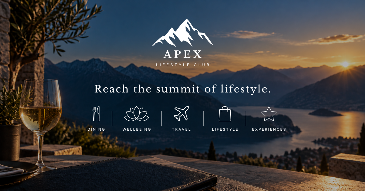 Sunset view over mountains and lake with a table in the foreground holding a glass of white wine, a plate, and a potted plant, promoting Apex Lifestyle Club and its activities.