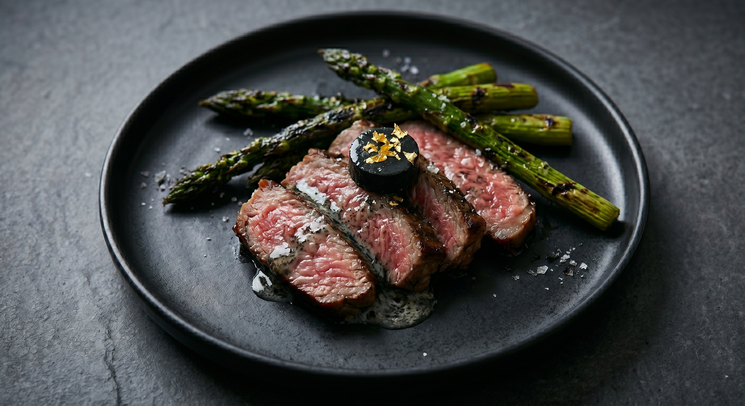 The Hit (The Main Course): The centerpiece is a luxury Wagyu Strip Loin finished with truffle butter and gold leaf, designed to feel like a VIP experience.