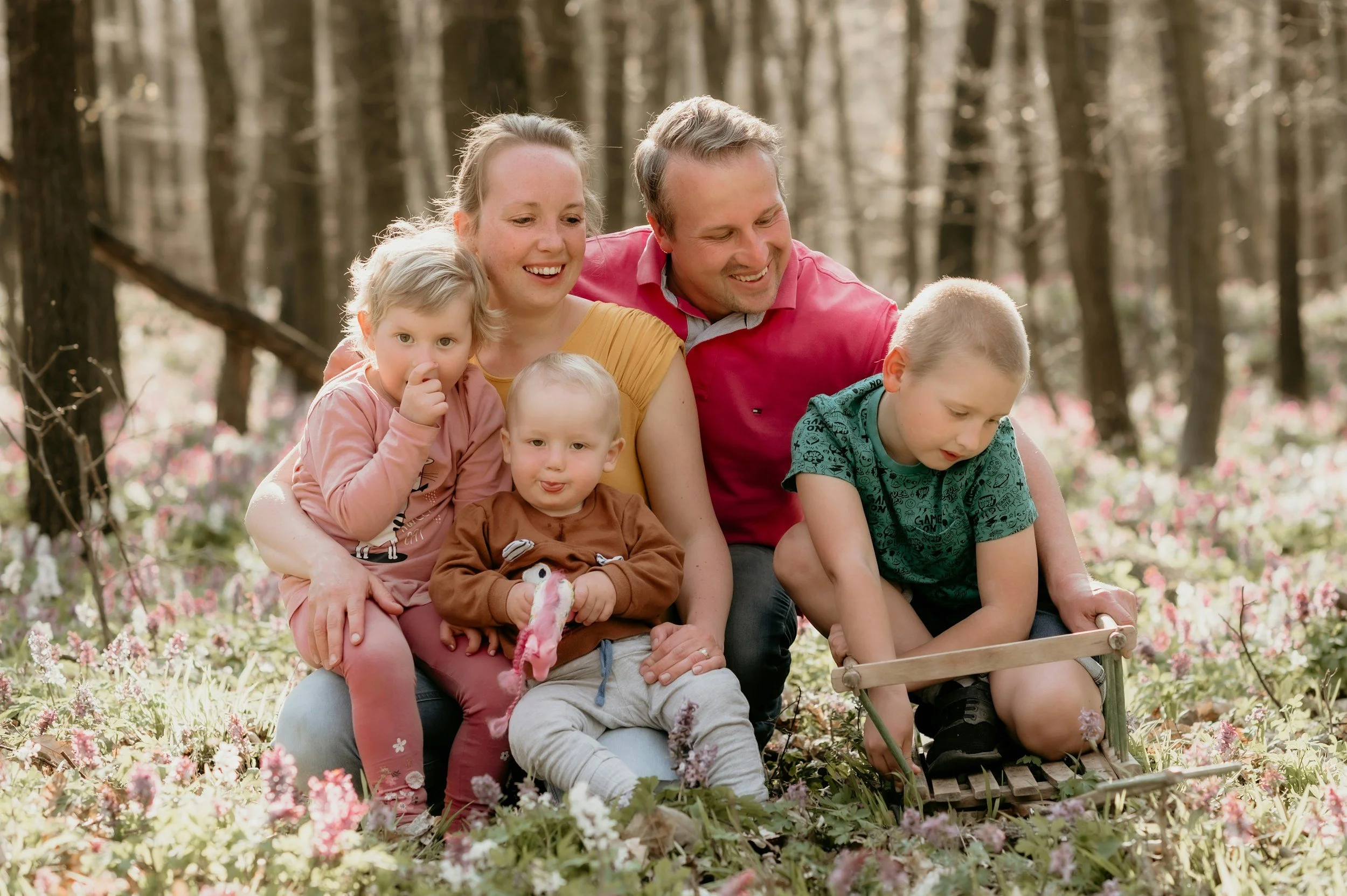 A Family Sitting Outside.