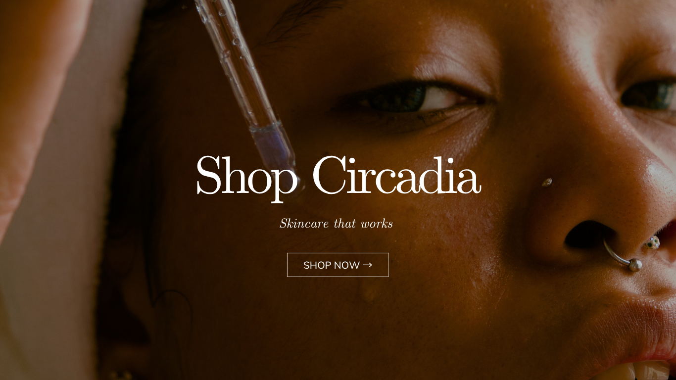 Close up of Woman with serum dropper next to face