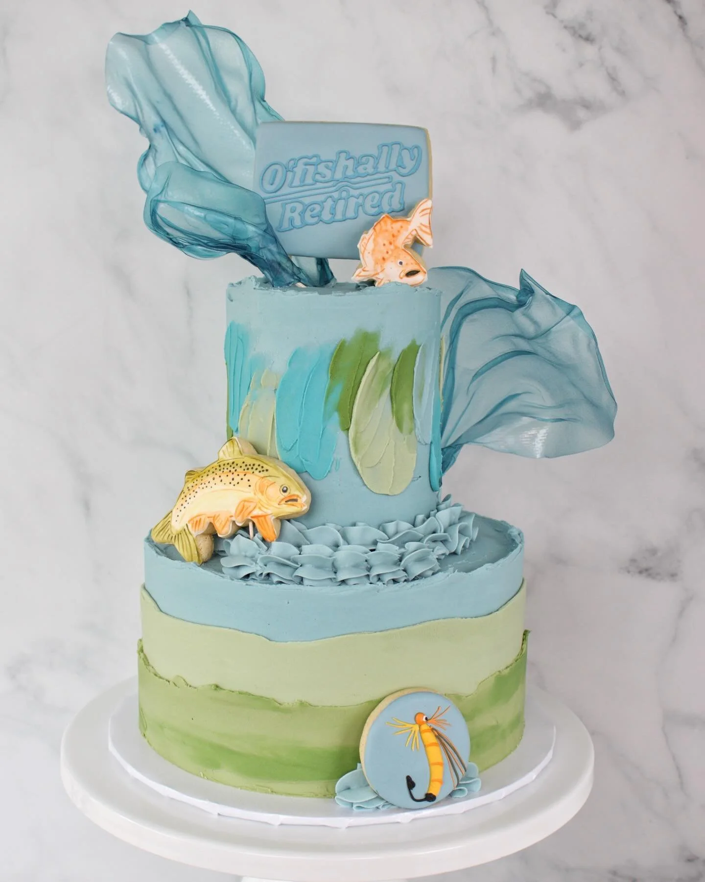 THE BIG REVEAL! We hope you followed along with us as we created the cake. Happy Retirement to Sami&rsquo;s dad! It&rsquo;s o&rsquo;fishally time to fish whenever you want!