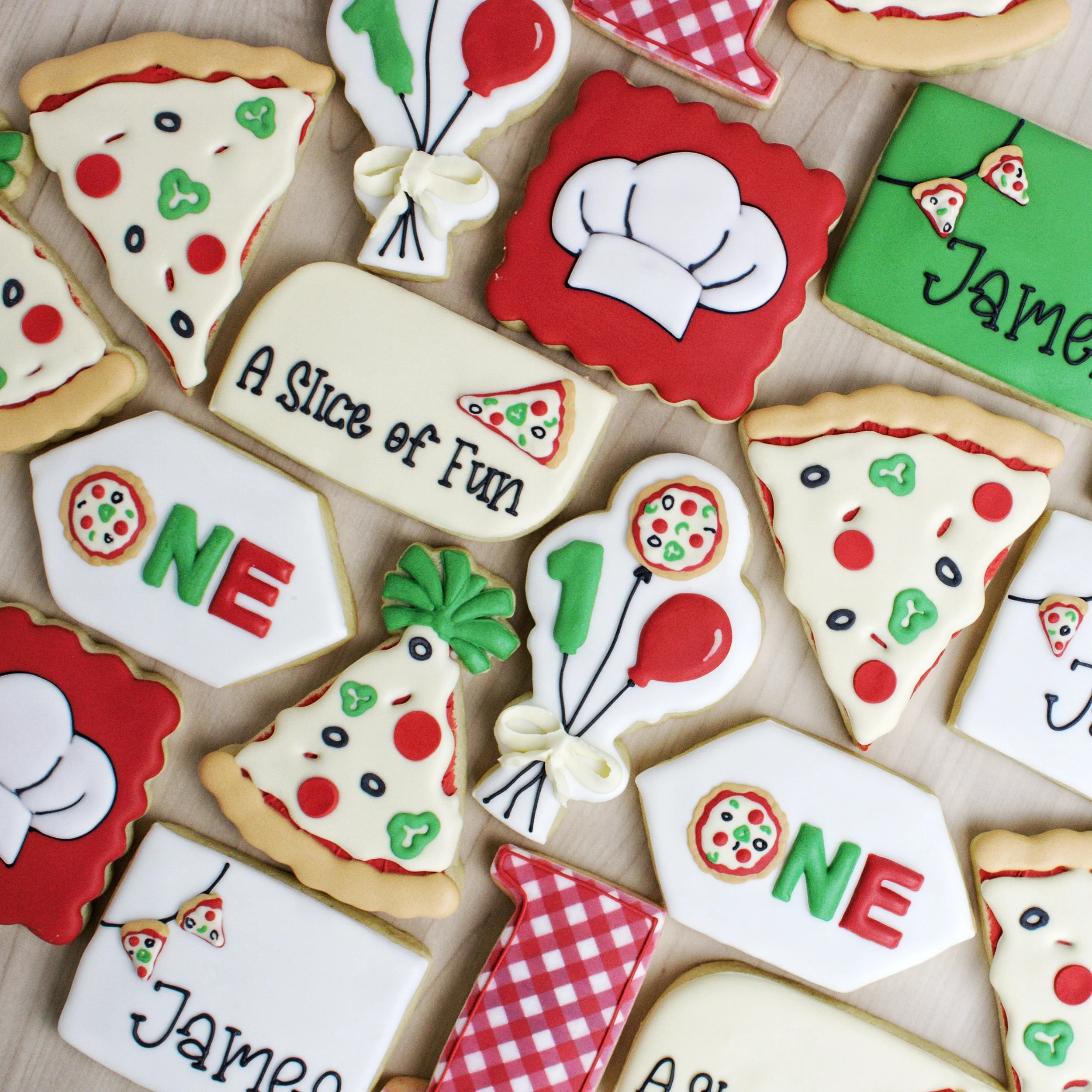 Royal icing decorated sugar cookies with theme "A slice of fun". Set includes: pizza, a chef's hat, "James" with pizza garland, and a checkerboard number 1.