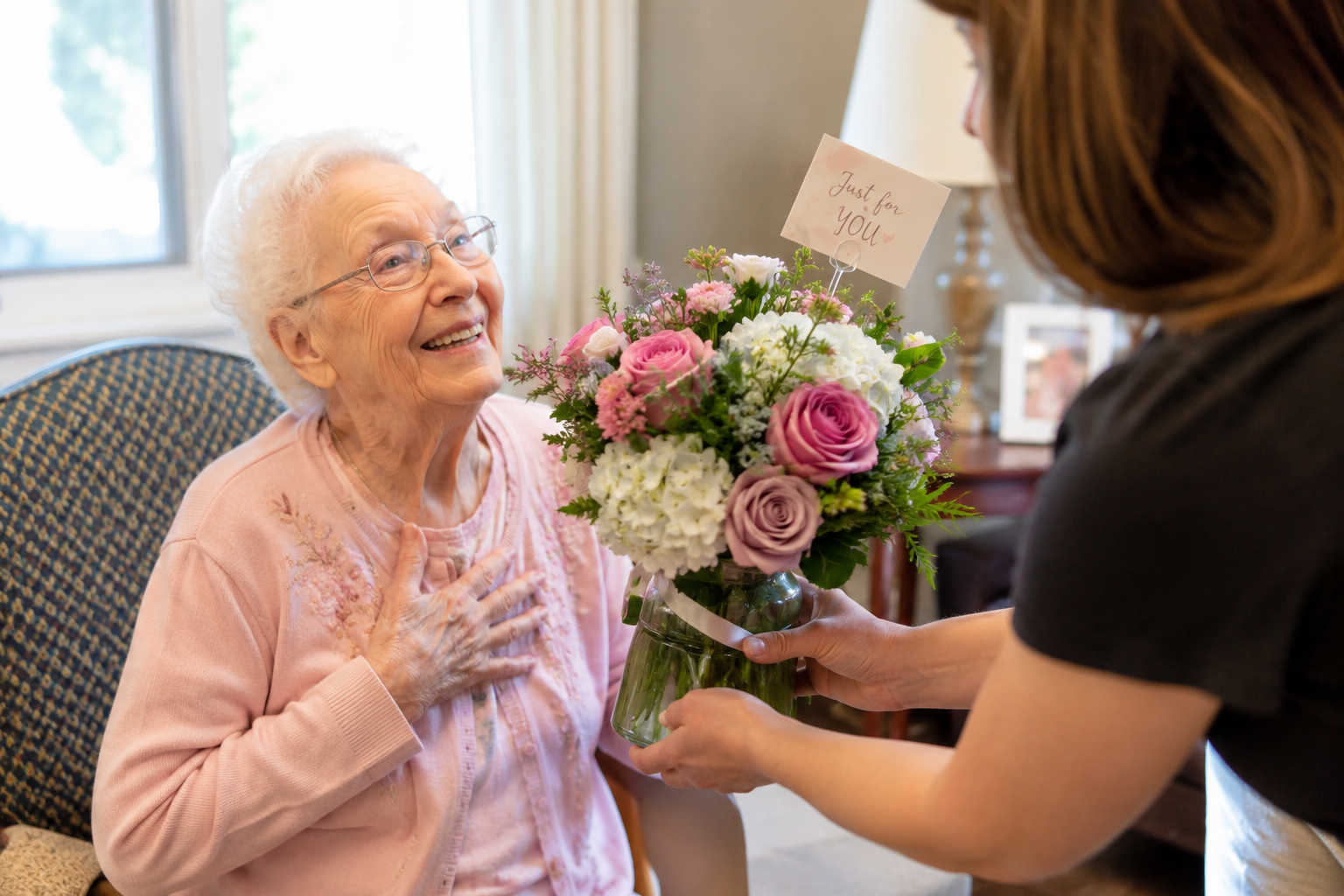 A senior receiving a fresh flower arrangement through the Blooms for Seniors program at The Bloom Center in Katy TX
