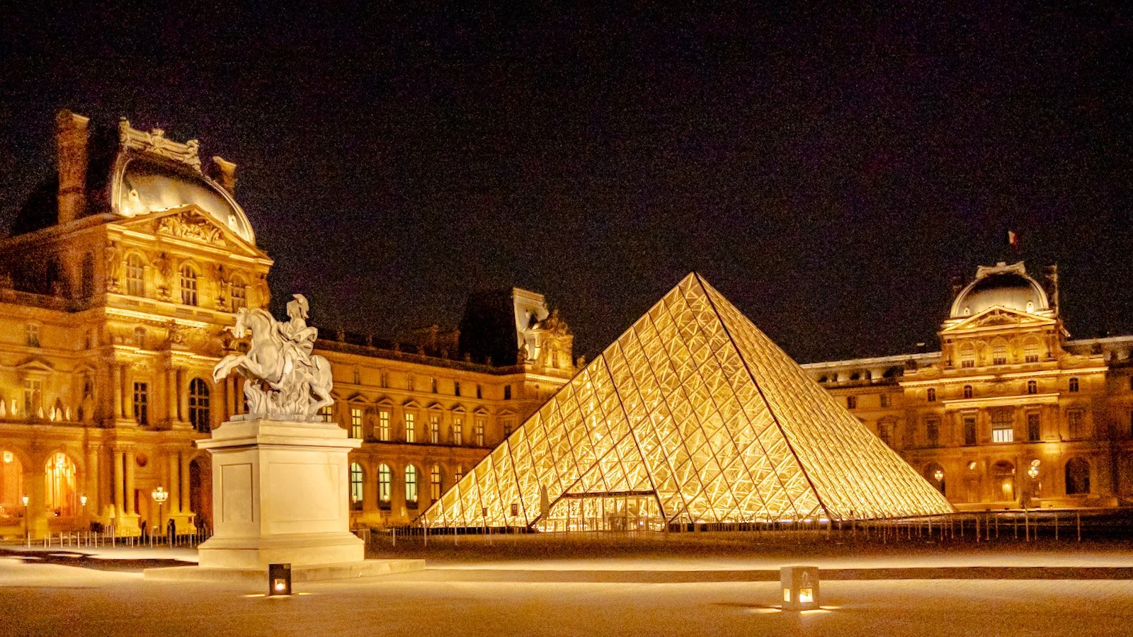 The Louvre in Paris at Night by Tim Tate.jpg