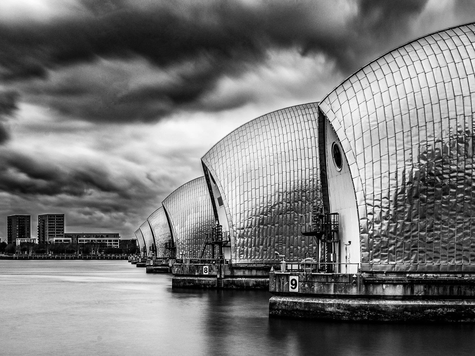 Thames Barrier at Greenwich with Stormy Sky by Tim Tate.jpg