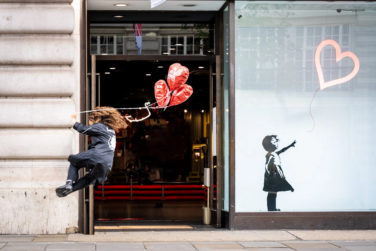 Girls with Balloons Banksy London by Tim Tate.jpg