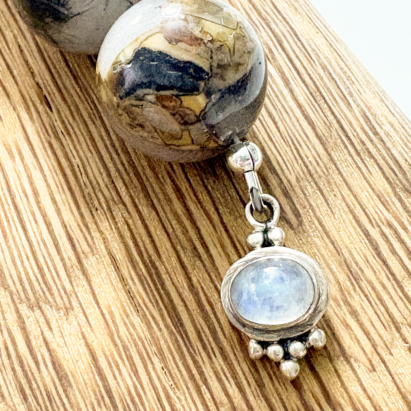 181 moonstone charm 8in.png
