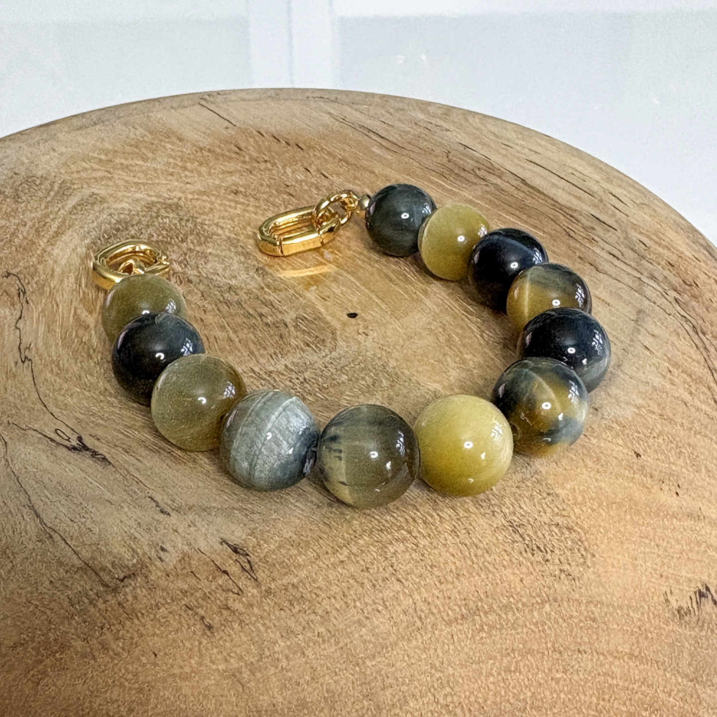 41 Tigers Eye golden blue 12mm 8in.png