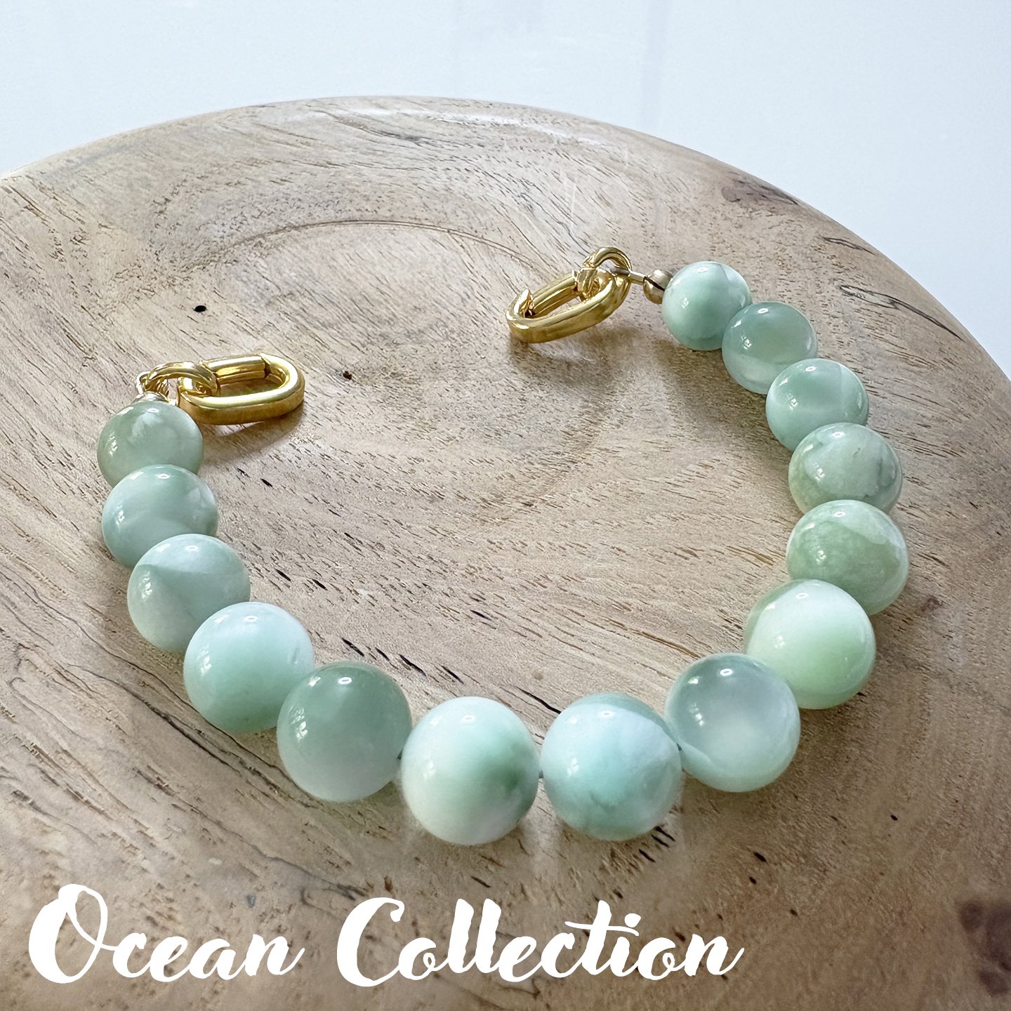 OCEAN 77 Iridescent yellow green moonstone 8in txt.jpg