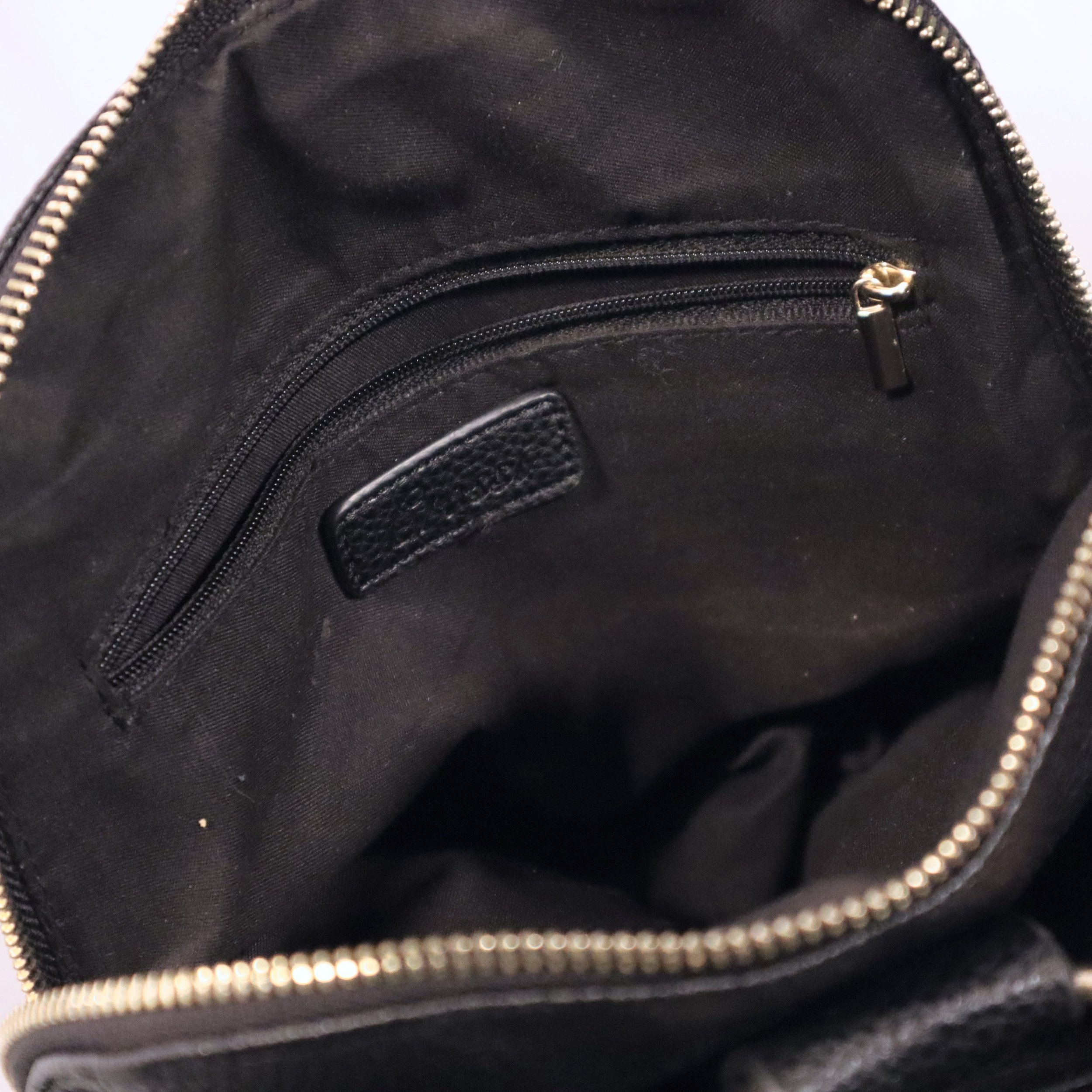 Black backpack with bow (2).jpeg