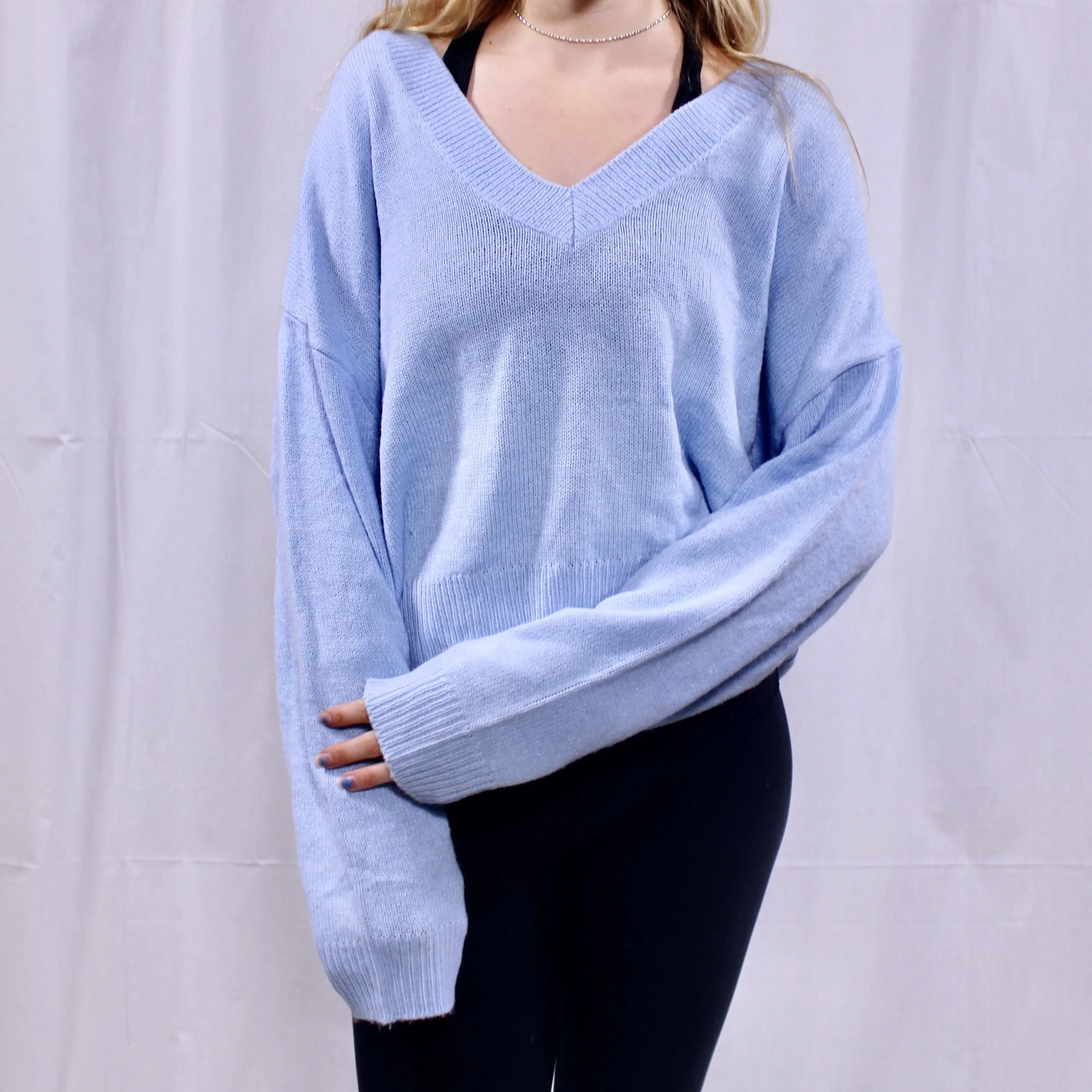 H&m light blue v-neck cropped sweater.jpeg