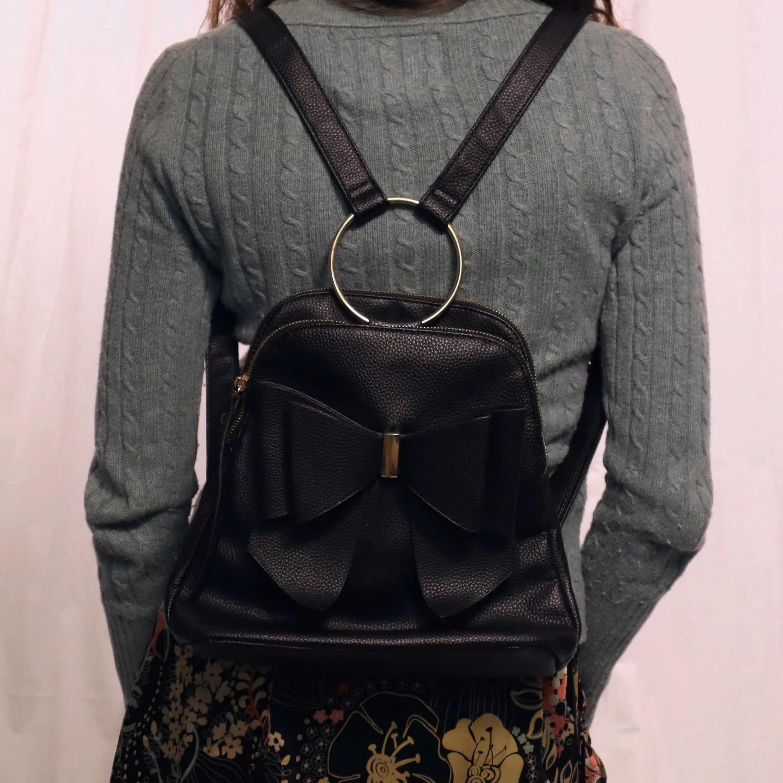 Black backpack with bow (1).jpeg