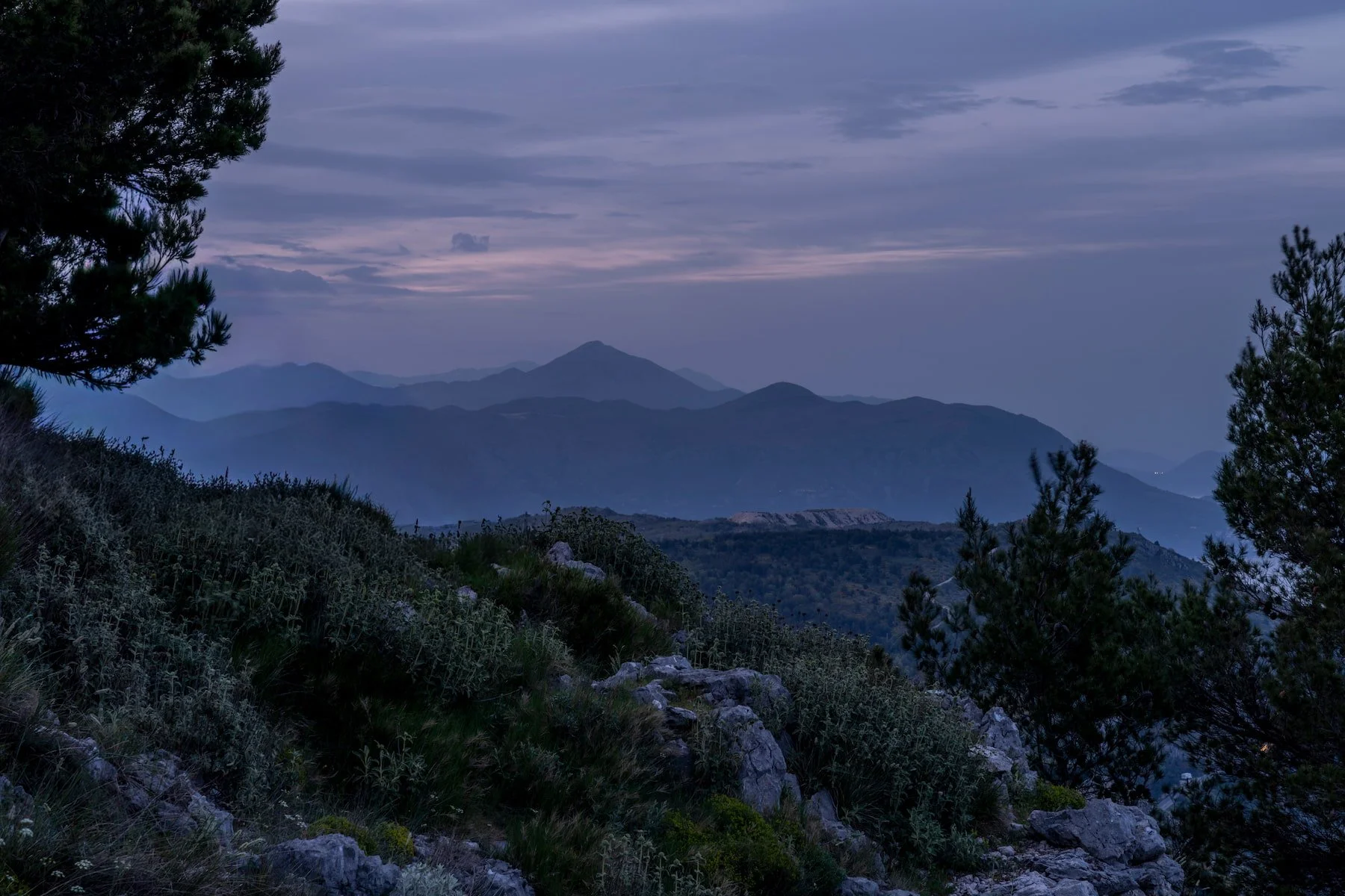 Layered Dinaric Alps mountains at dusk from the Mt Srd viewpoint.