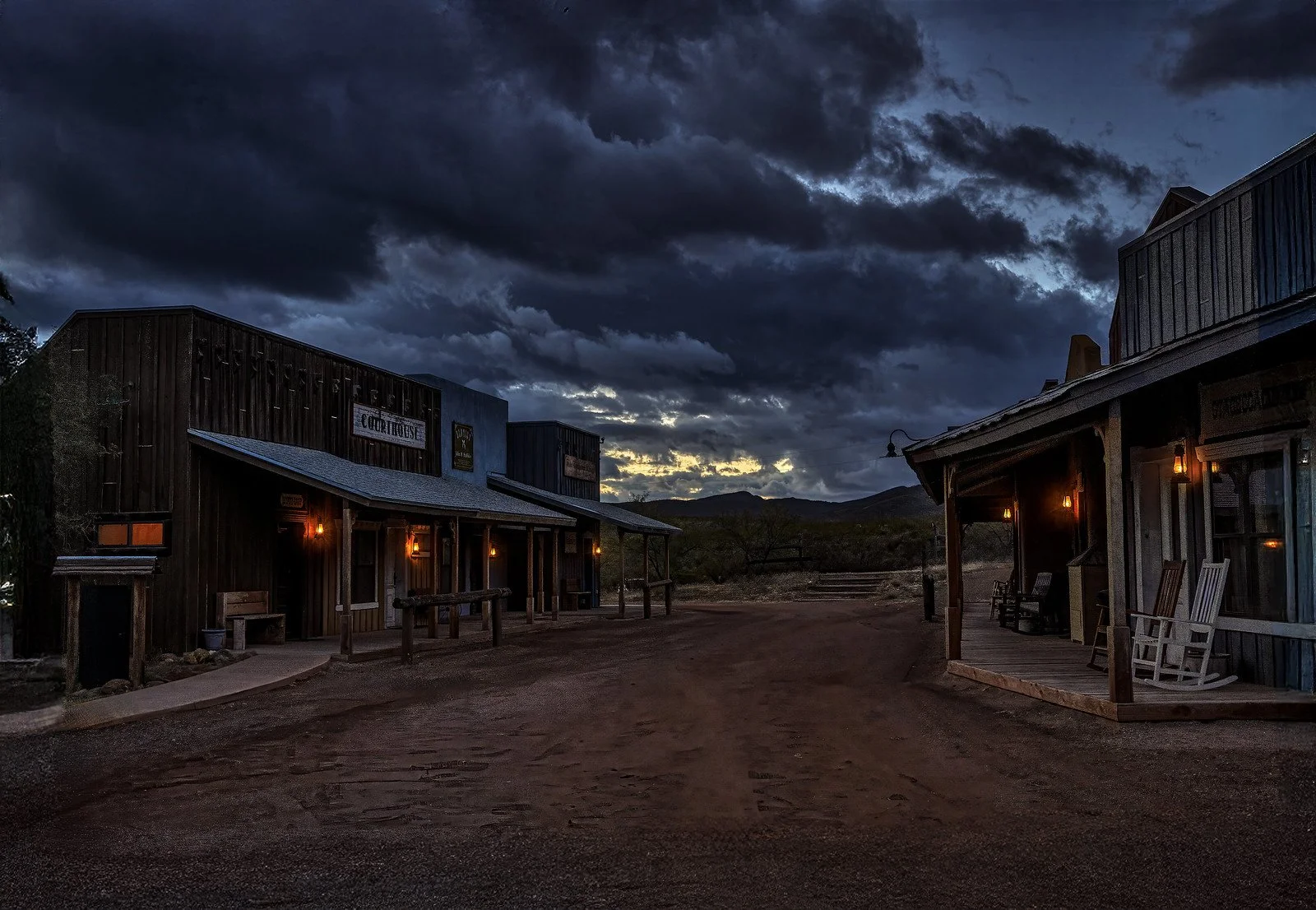 Dramatic storm clouds over Tombstone Monument Ranch’s Old West-style main street.