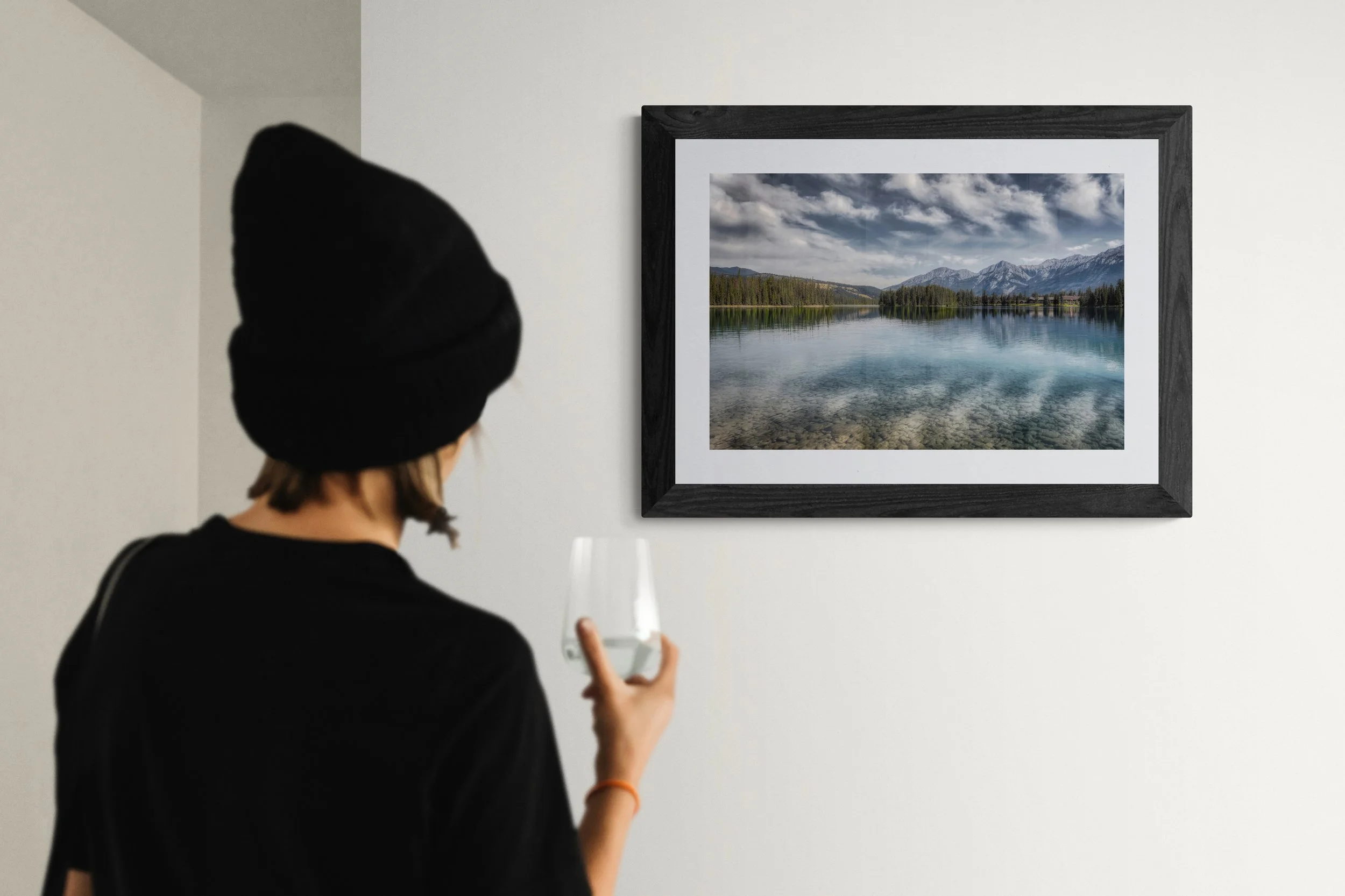 Lac Beauvert - close-up-of-a-woman-next-to-a-gallery-wall.jpg