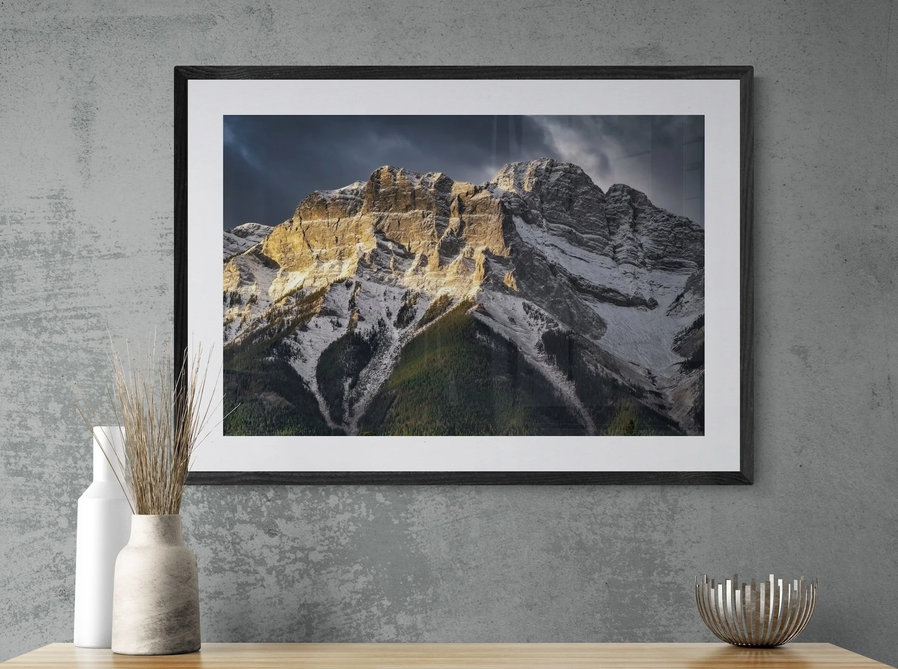 Canmore at Dawn framed over cabinet with ceramic vases.jpg