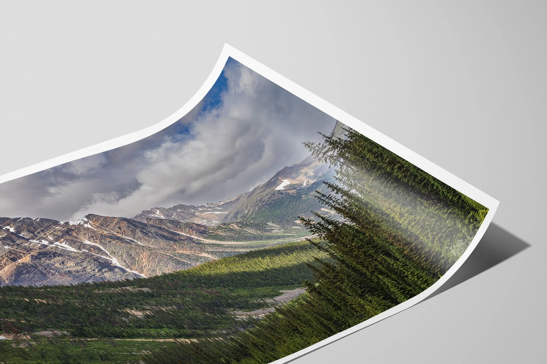 Close-up of Path of the Glacier limited-edition fine-art matte photo print with a white border, shown as an unframed, curled print.