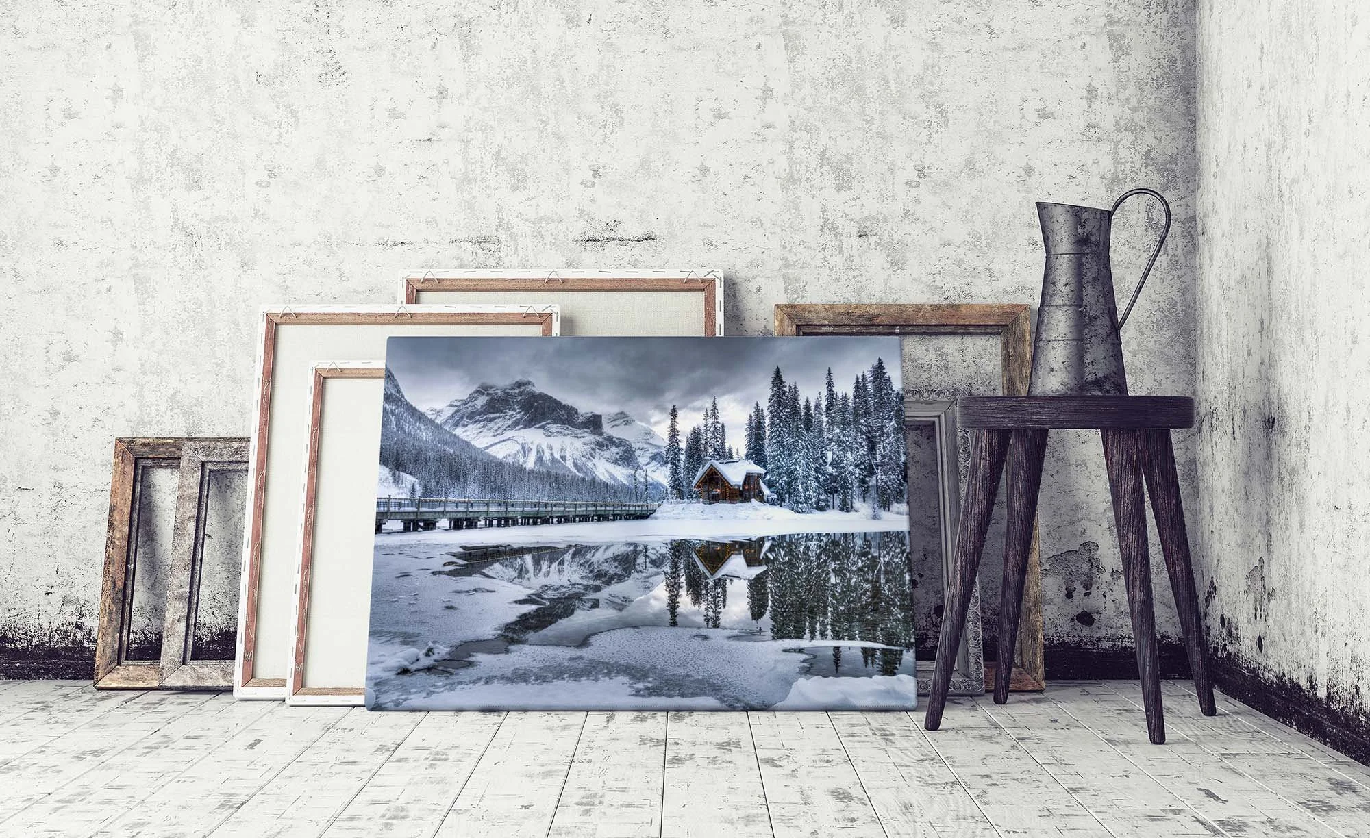 Emerald Lake Lodge Winter canvas leaning against other frames.jpg