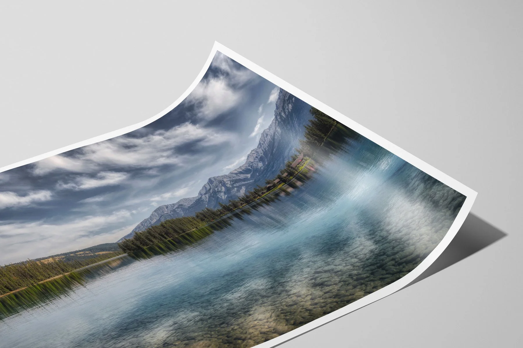 Close-up of a Lac Beauvert Reflections limited-edition fine-art matte print with a white border, shown as an unframed, curled print.