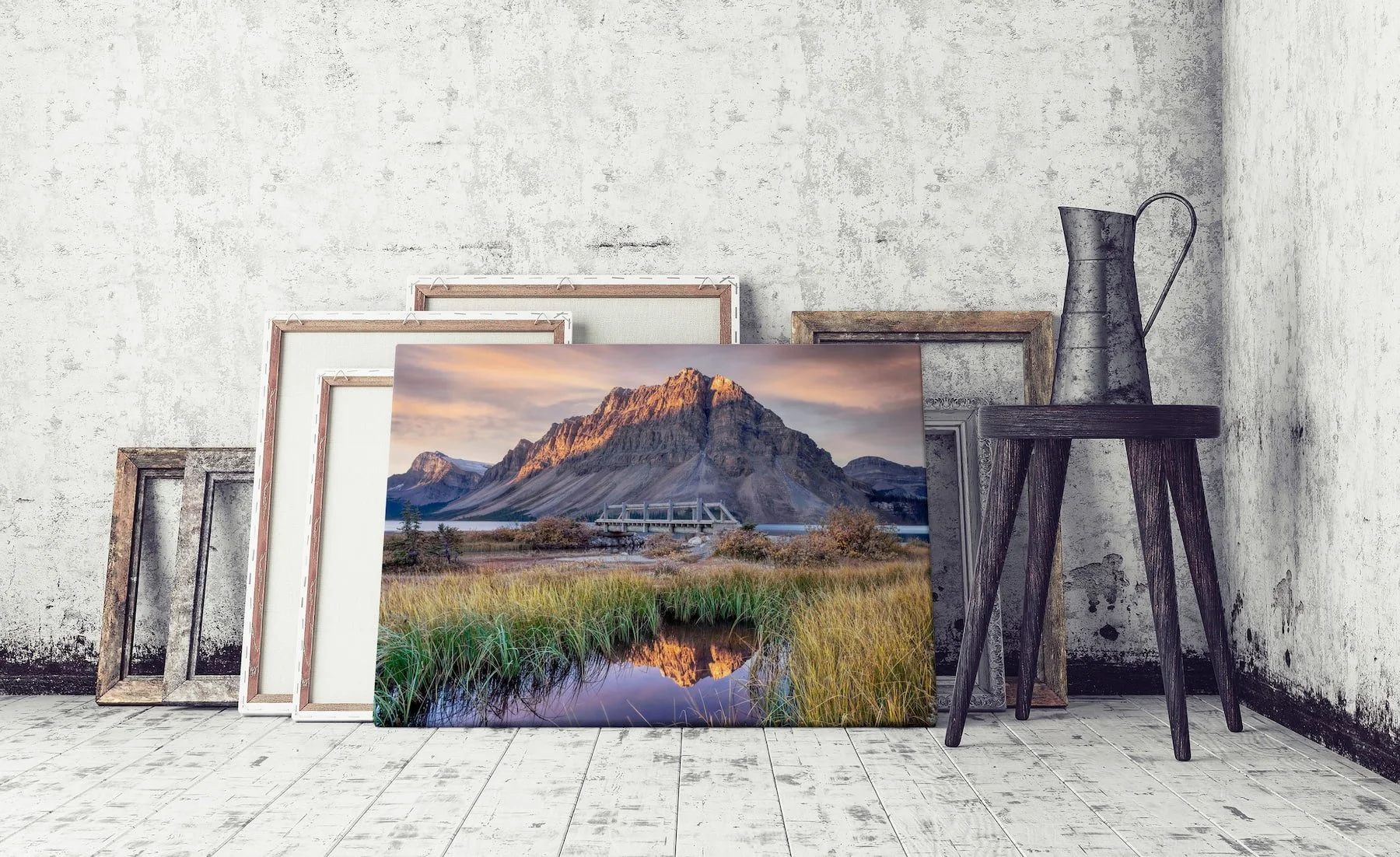 Bow Lake at Dawn canvas print leaning against other prints.