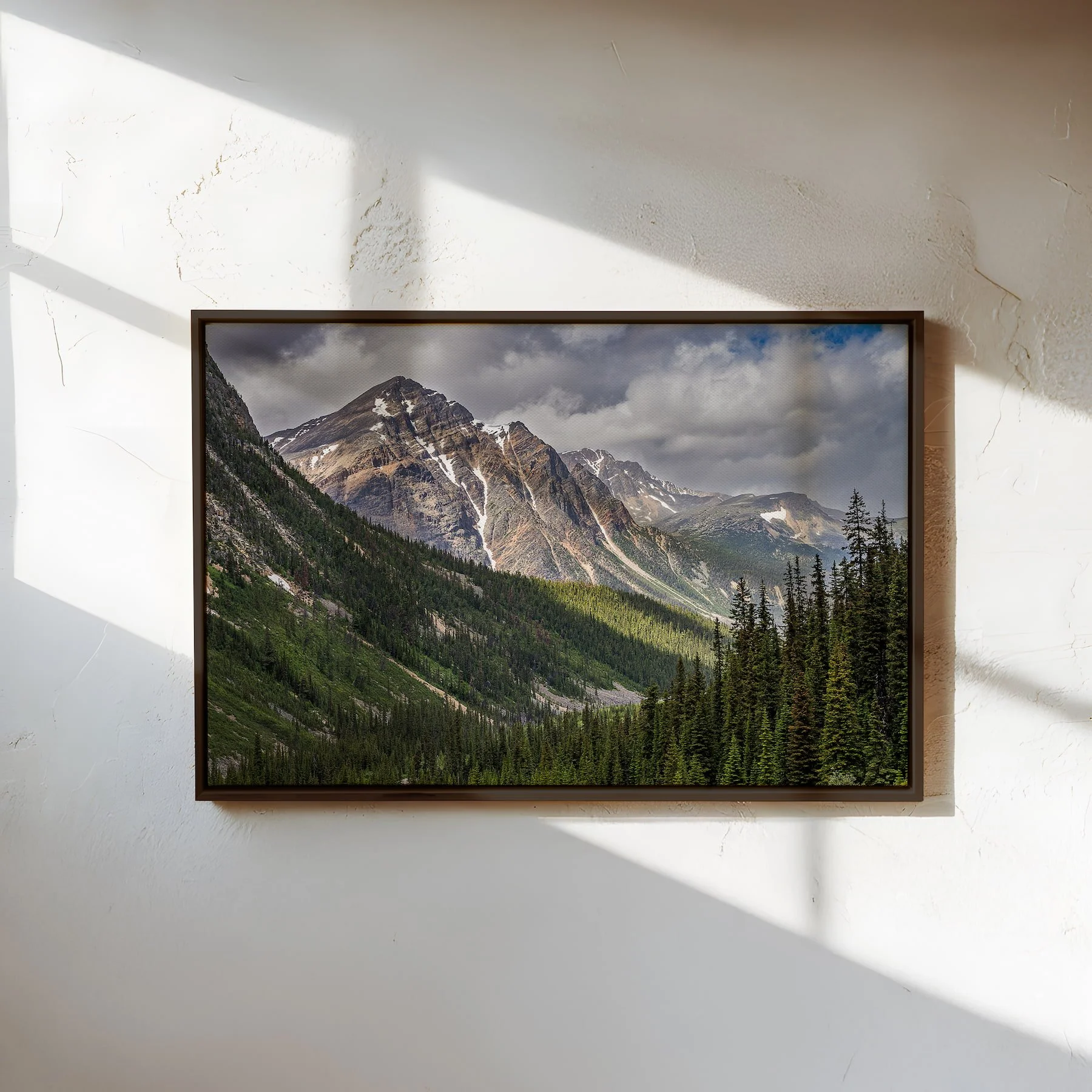 Path of the Glacier fine art canvas print in slim espresso float grame on textured wall with light and shadows..jpg