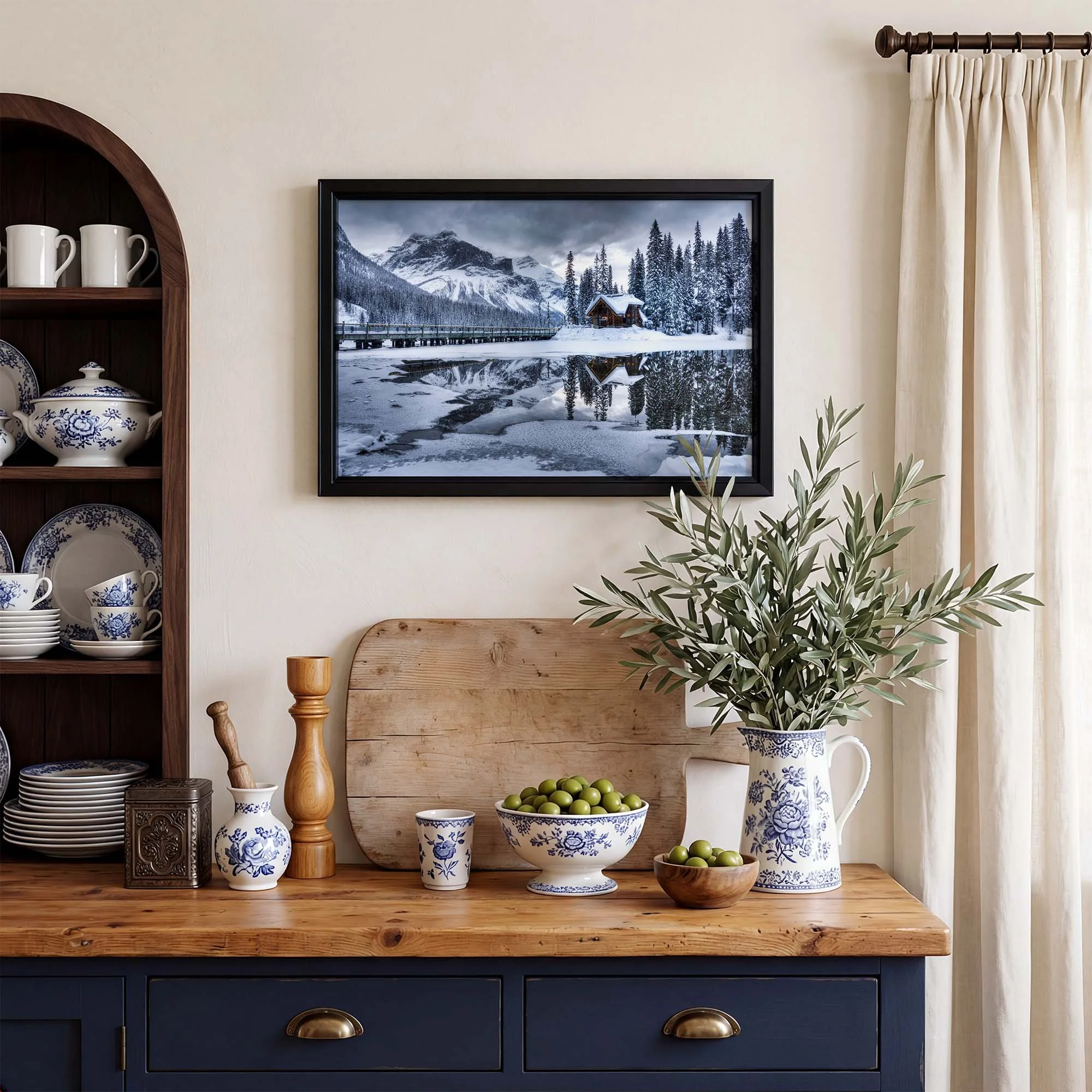 Emerald Lake Lodge Winter framed print over kitchen side table.jpg