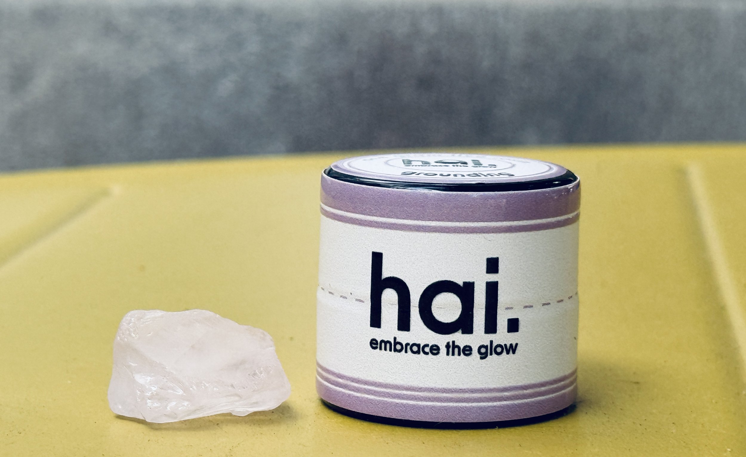 hai cannabis rosin jar and rose quartz crystal