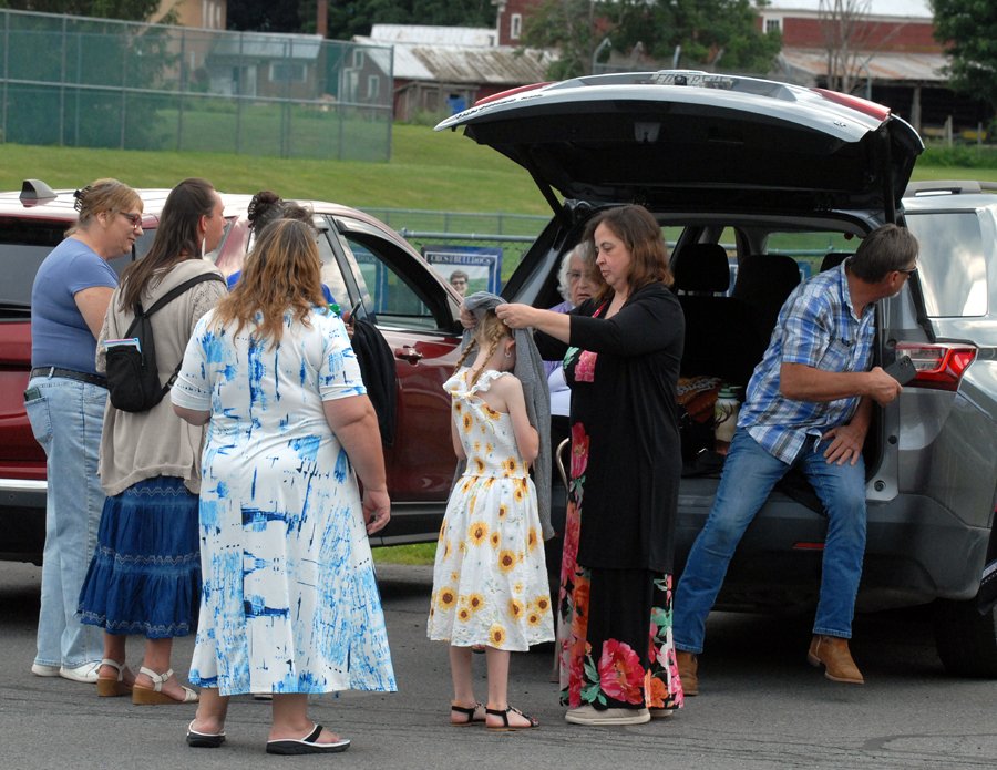 CR grad. family at car.jpg
