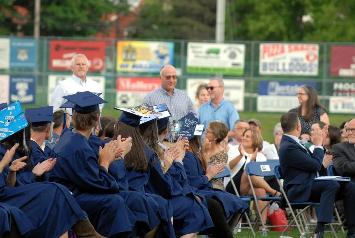 CR grad. applaud retiring teachers.jpg