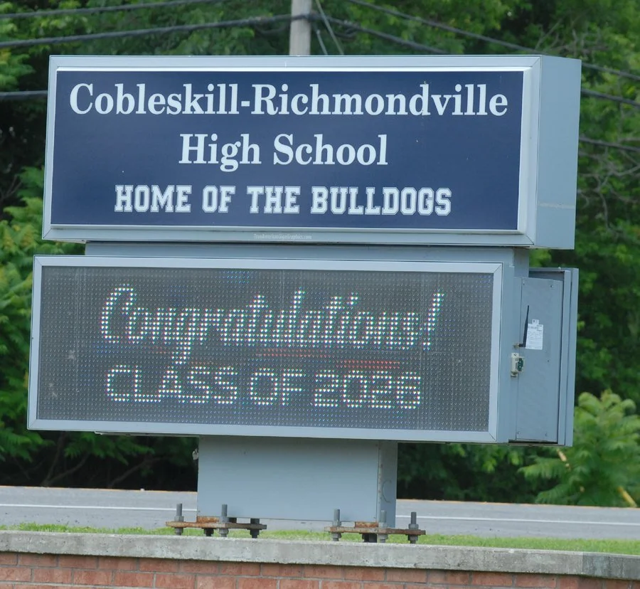 CR grad. sign.jpg