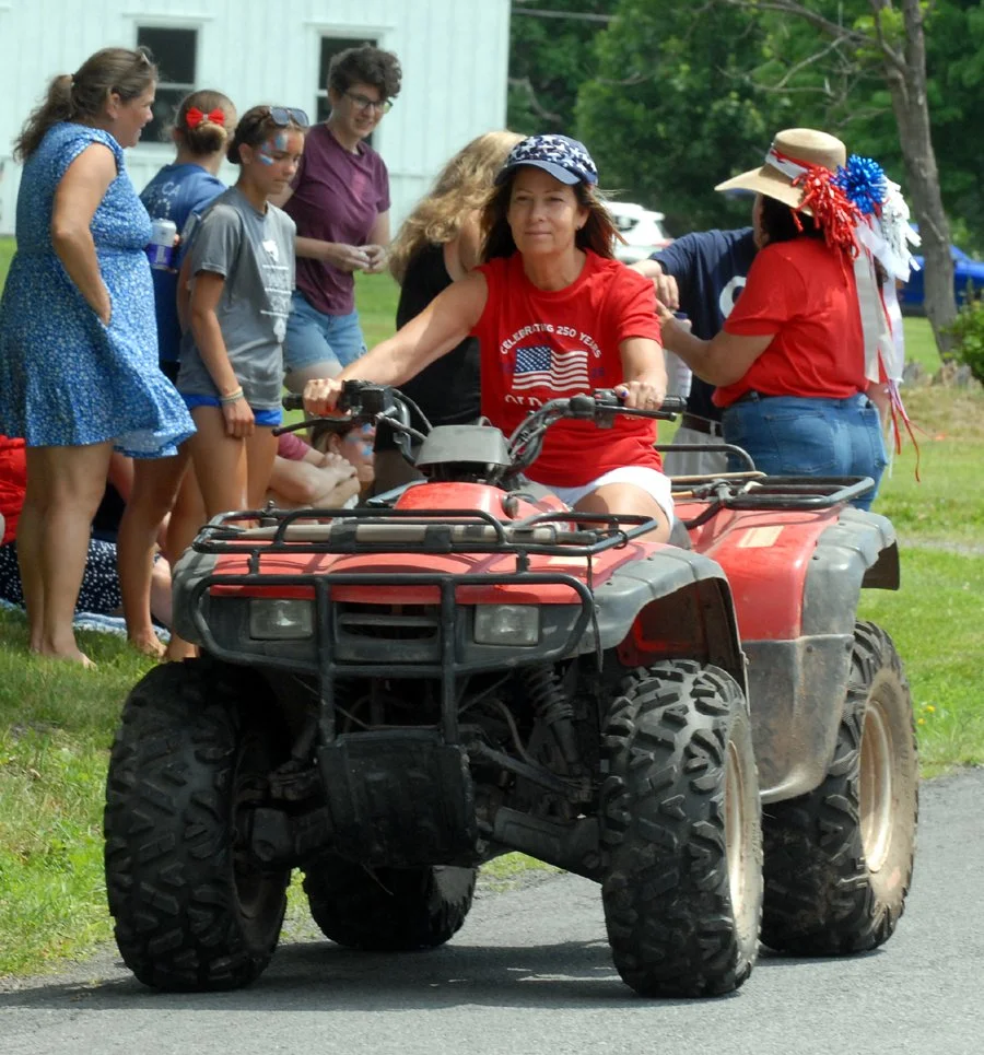 G4. woman 4 wheeler.jpg