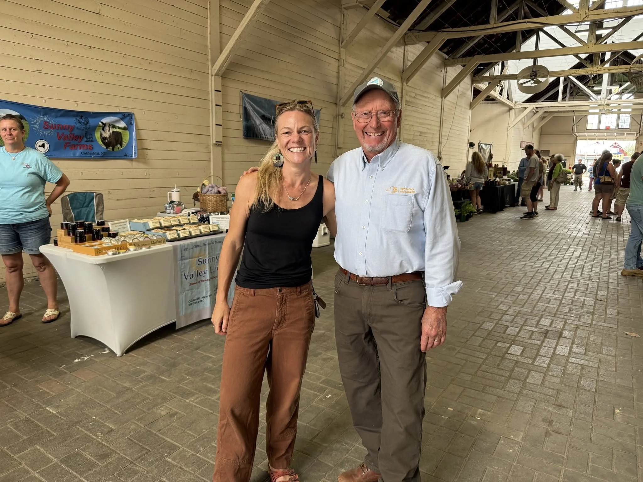 County Ag Specialist poses with Ag Commissionert Ball during Ball's visit t o the Schoharie County Farmers Market.
