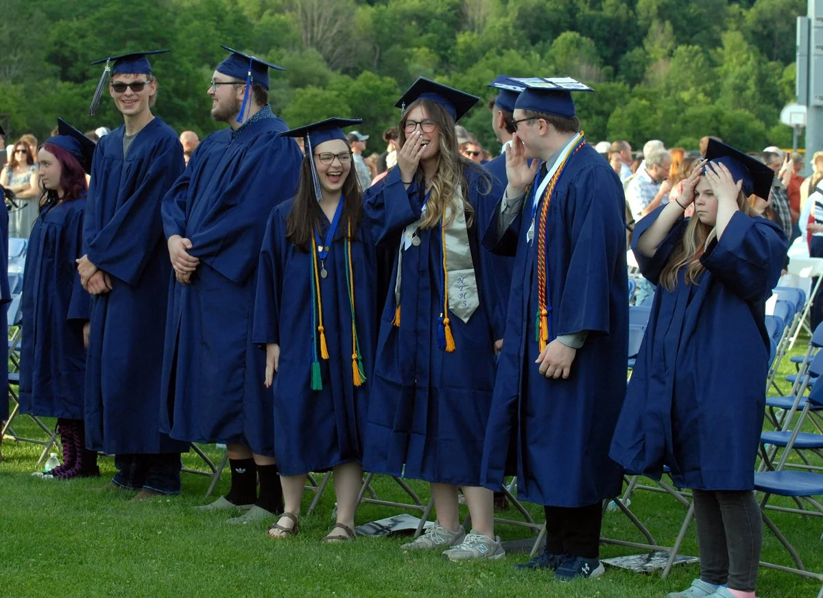 Cobleskill-Richmondville graduates-to-be share a laugh at ceremonies get underway.