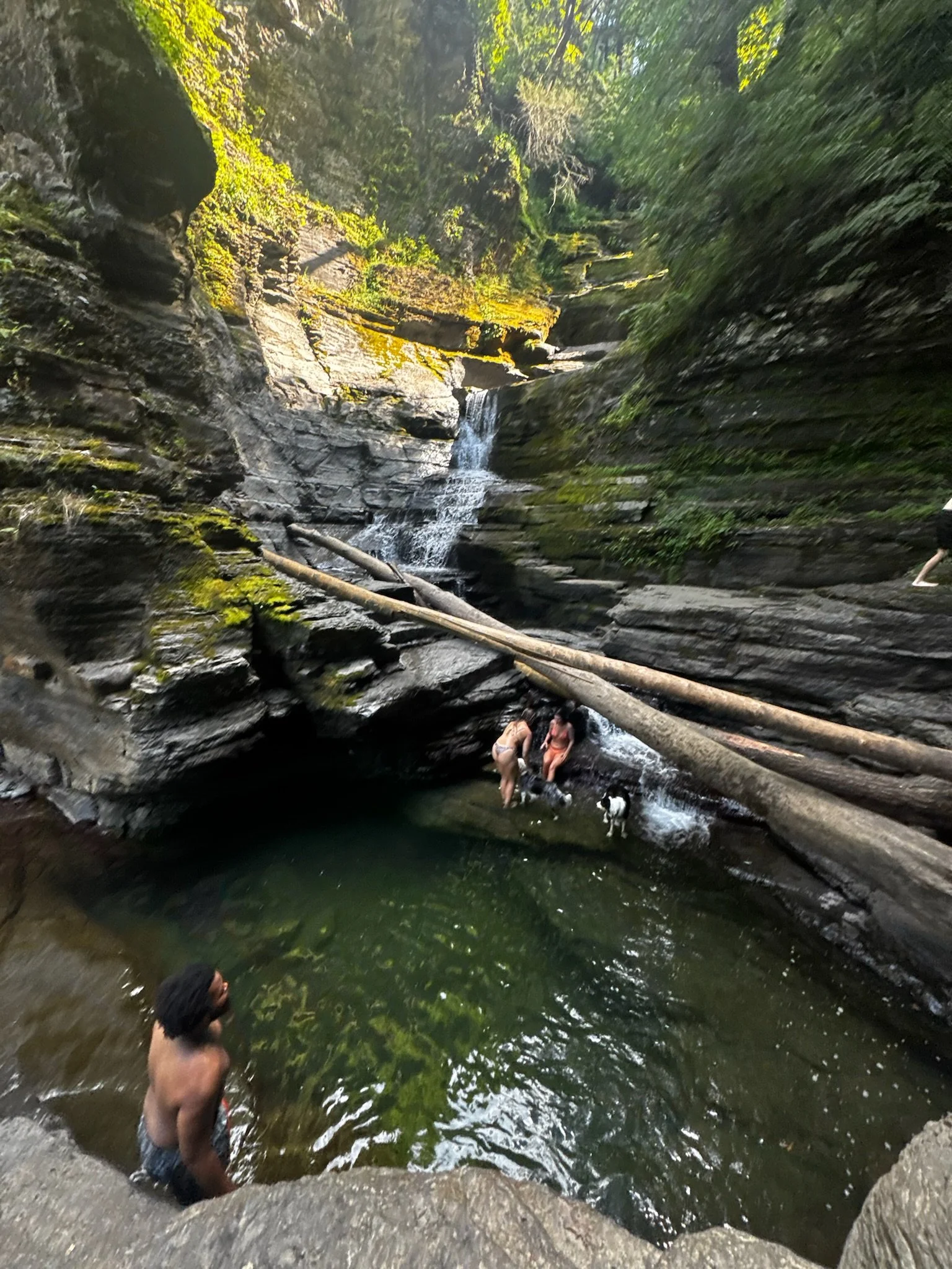 People discovering and enjoying a waterfall in Schoharie, County located in upstate New York