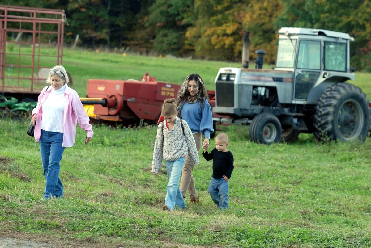 A family arrives at the Central Bridge celebration.