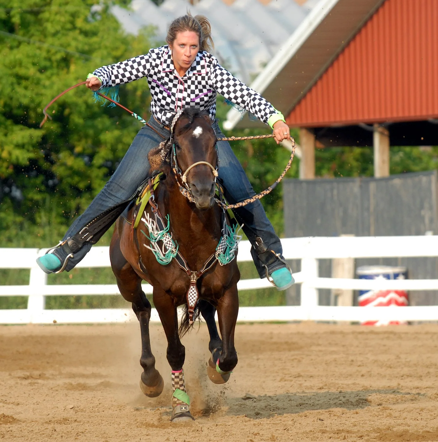 A Fair gymkana rider races to the gate.