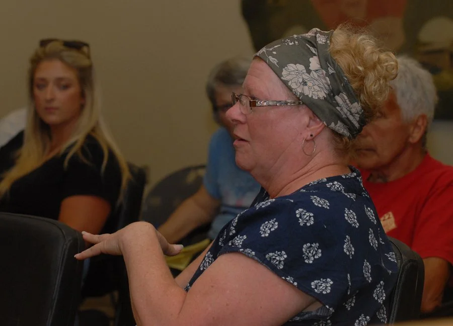 Farmer Jeannette Spaulding asks questions at listening session.