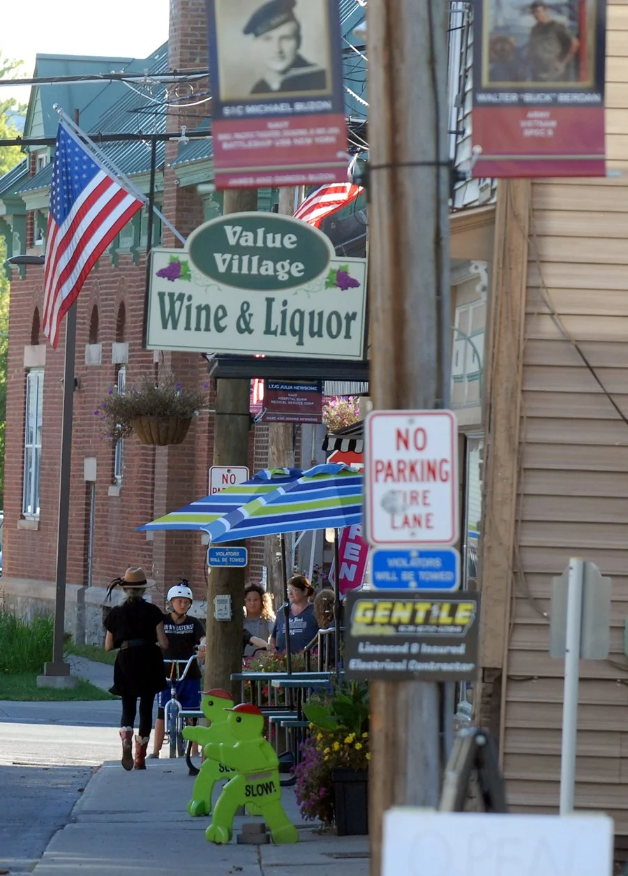 Kids on bikes gather at the corner of Middleburgh's Railroad Avenue and Main Street on 4th Friday.
