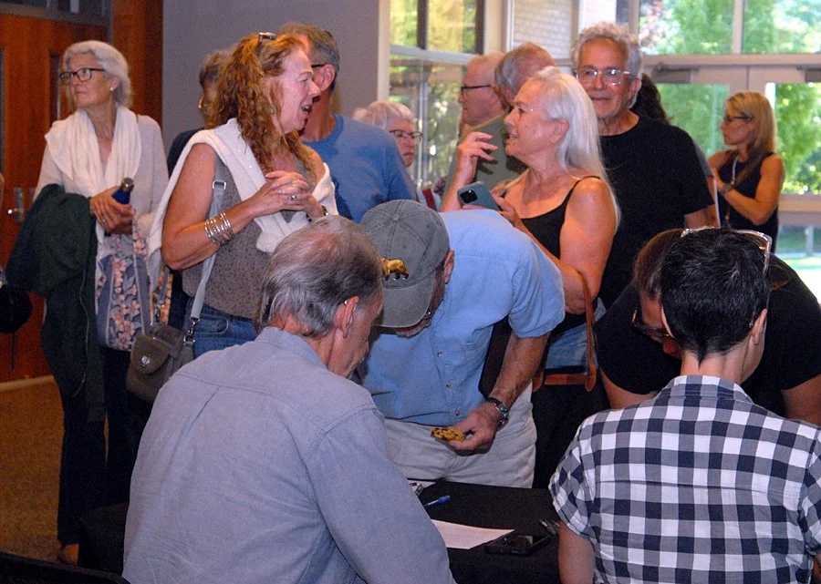 Activists sign a petition to stop the Constitution Pipeline  at an info session  held at SUNY Cobleskill.