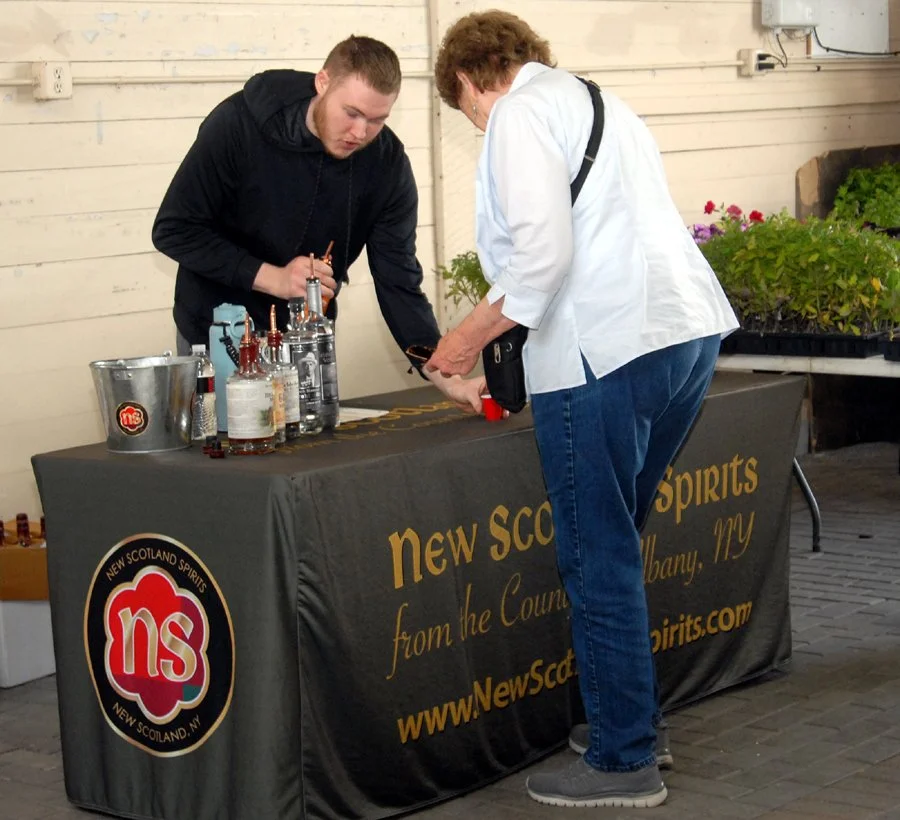 New Scotland Spirits' Jason Daus serves up a sample.