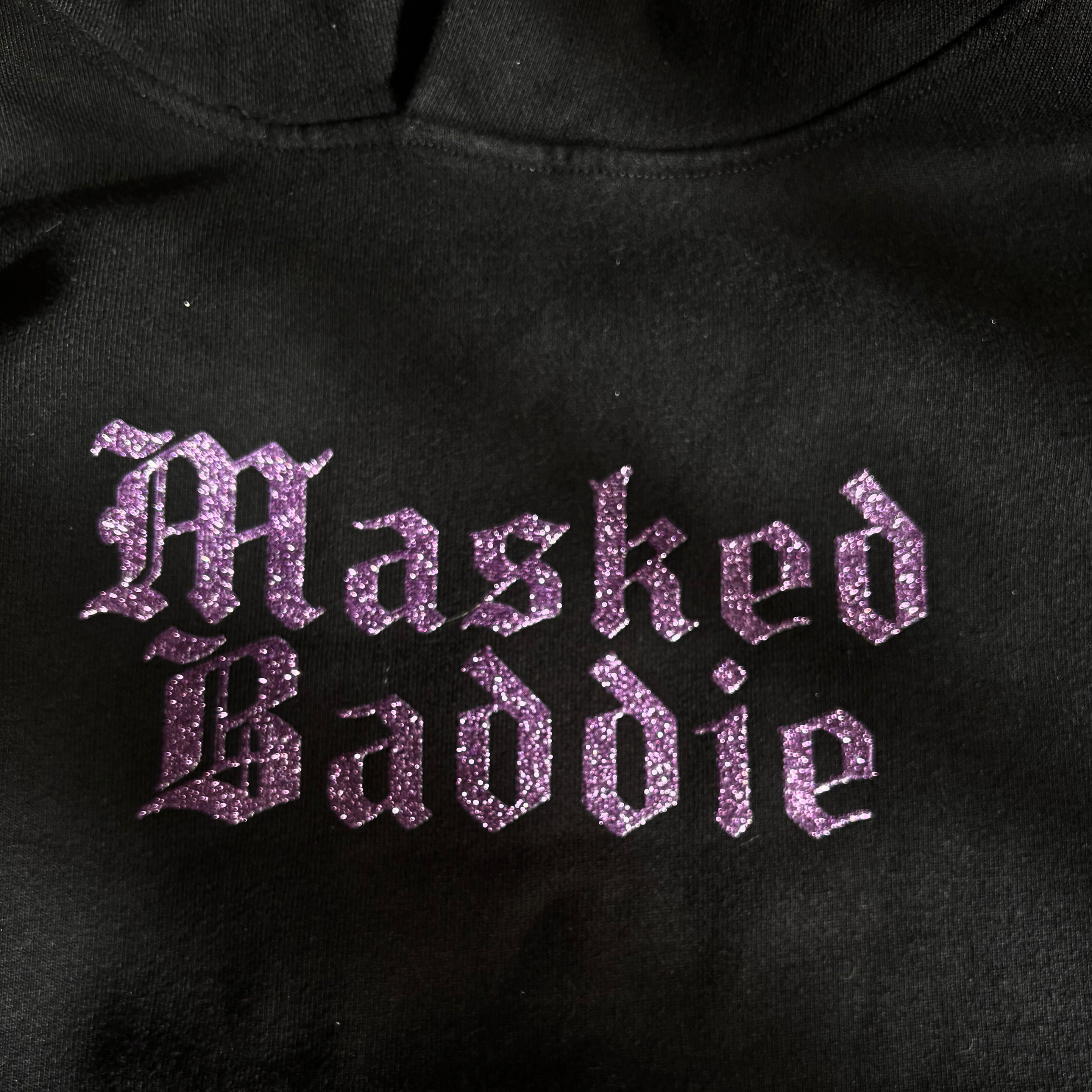 MASKEDBADDIEDETAILSHIMMER.png