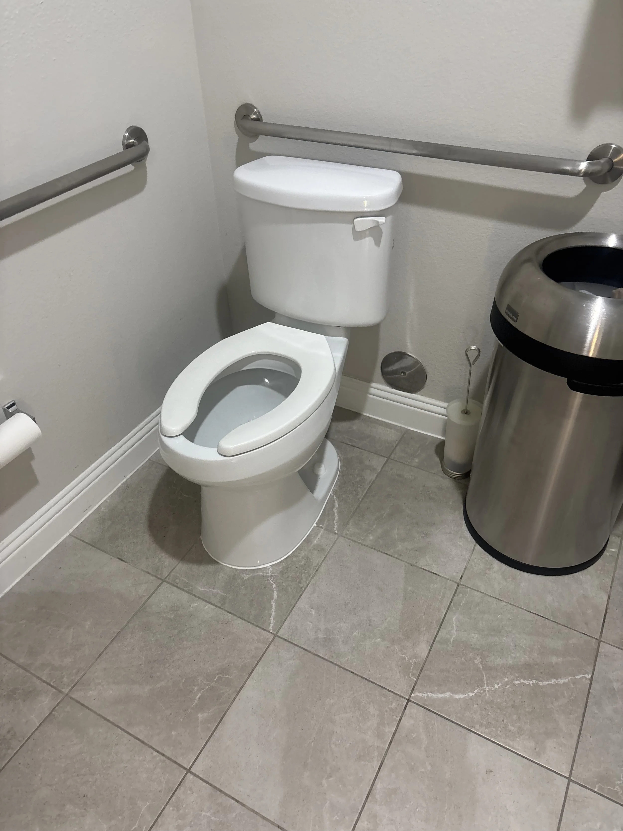 Completed toilet replacement in residential bathroom