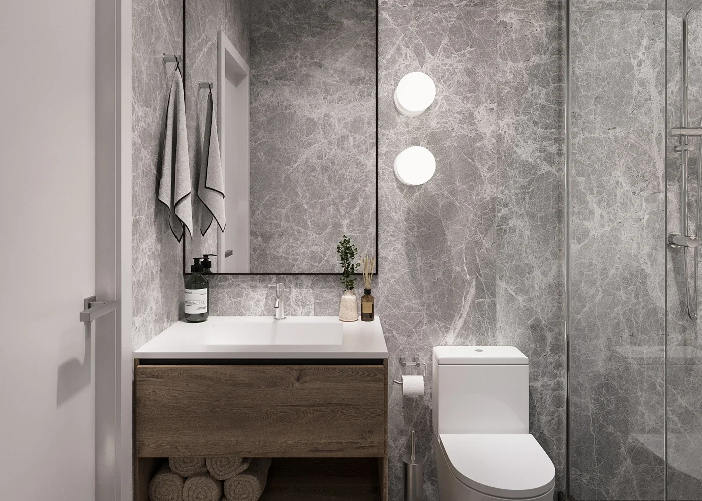 Modern ADU bathroom design with wood vanity, gray stone walls and compact layout